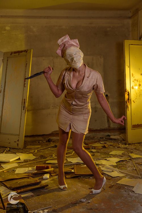 Silent Hill Nurse Cosplay http://geekxgirls.com/article.php?ID=7837